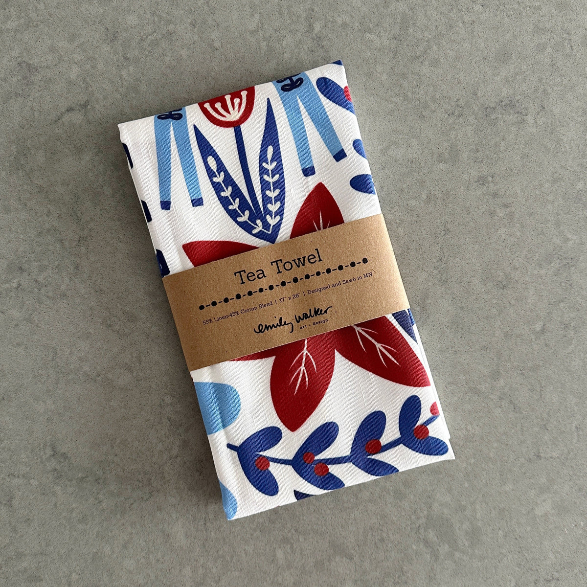 Reindeer tea towel folded with tea towel label.